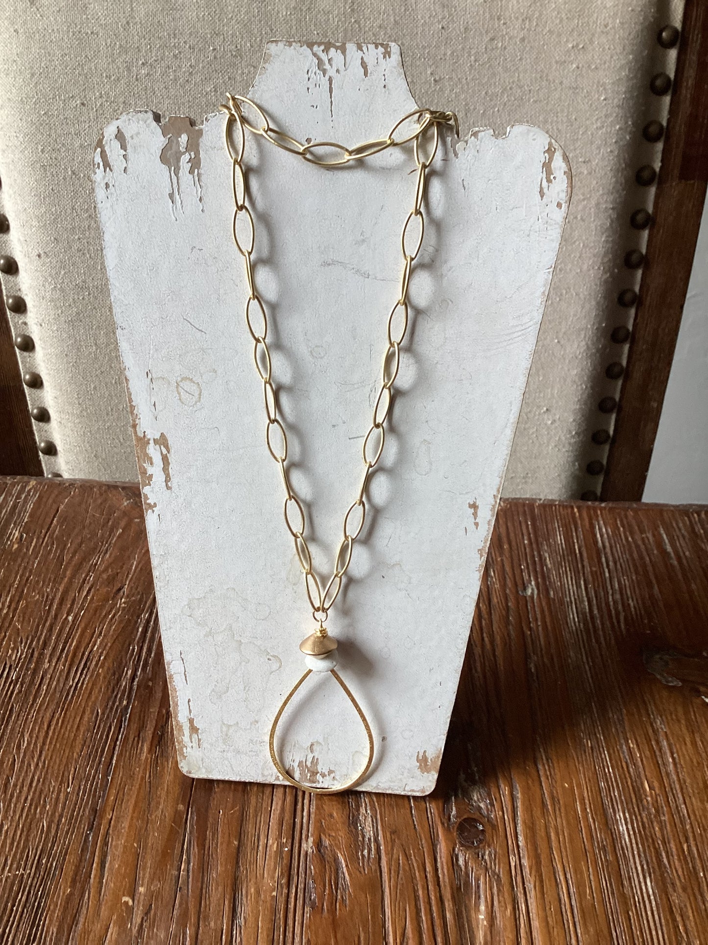 Gold oval bead necklace